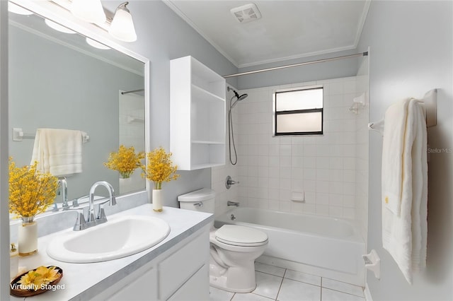 full bathroom featuring vanity, tile patterned floors, tiled shower / bath combo, toilet, and ornamental molding