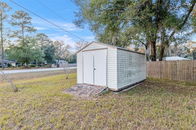 view of outdoor structure with a yard