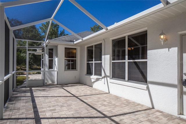 unfurnished sunroom with vaulted ceiling