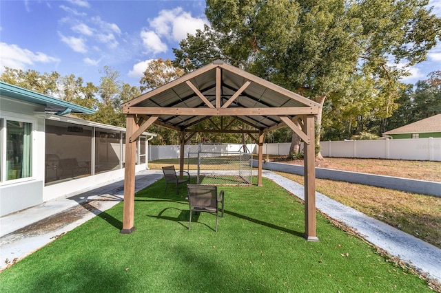 surrounding community featuring a gazebo and a lawn