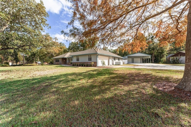 view of yard featuring a garage