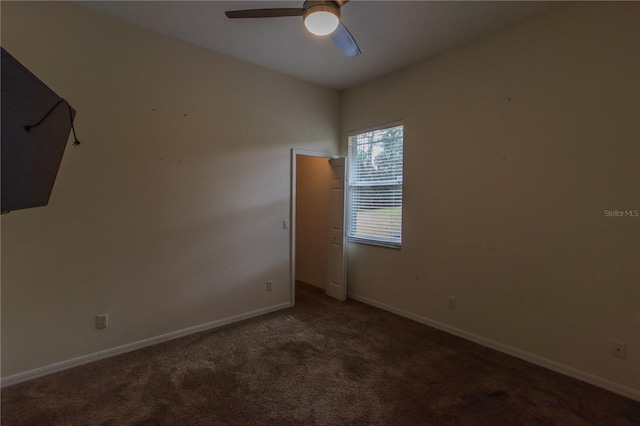 carpeted empty room with ceiling fan