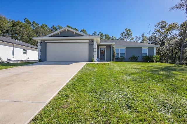 ranch-style house with a garage and a front yard