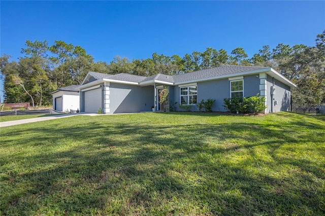 single story home with a garage and a front yard