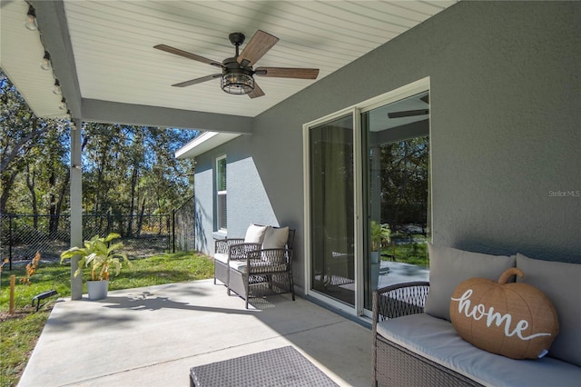 view of patio with ceiling fan