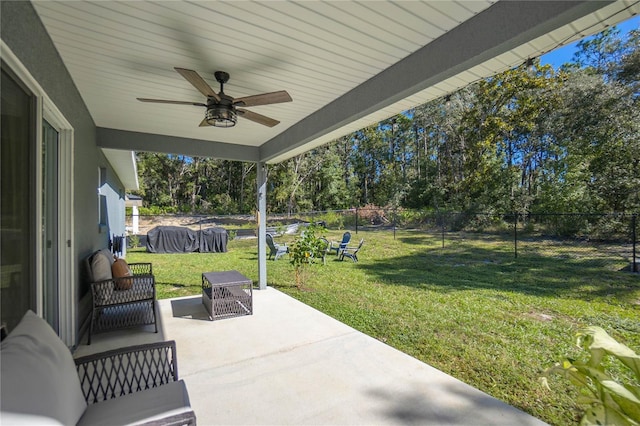 view of patio featuring an outdoor hangout area and ceiling fan