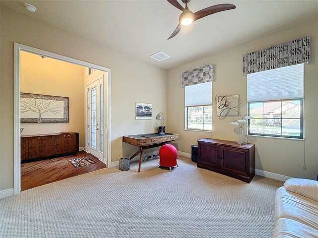 office area with ceiling fan and hardwood / wood-style floors