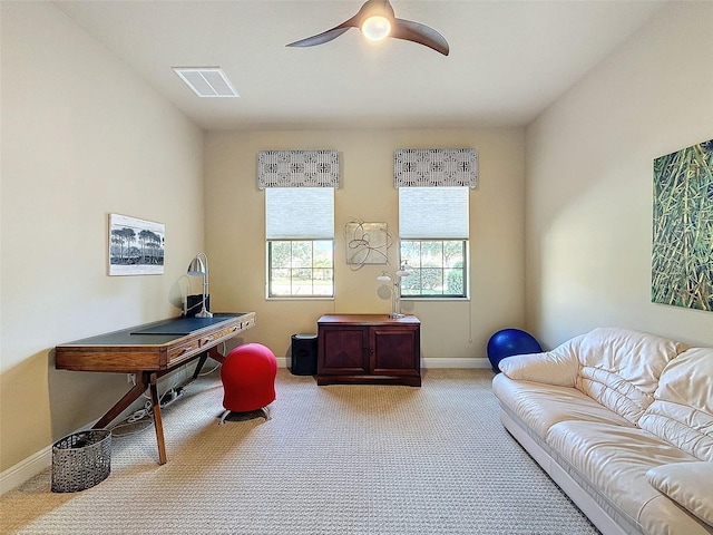 office area with light colored carpet and ceiling fan