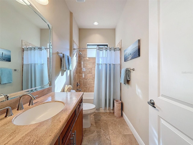 full bathroom with vanity, toilet, and shower / tub combo with curtain