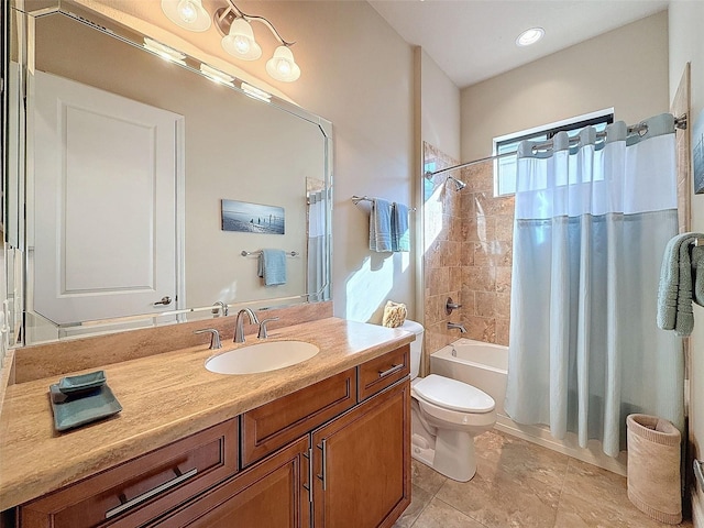 full bathroom with tile patterned floors, shower / tub combo with curtain, vanity, and toilet