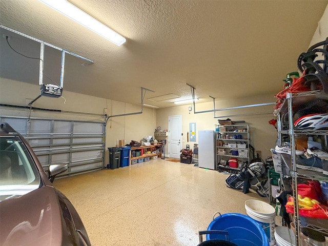 garage with electric panel and a garage door opener