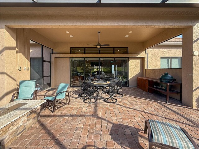 view of patio with ceiling fan