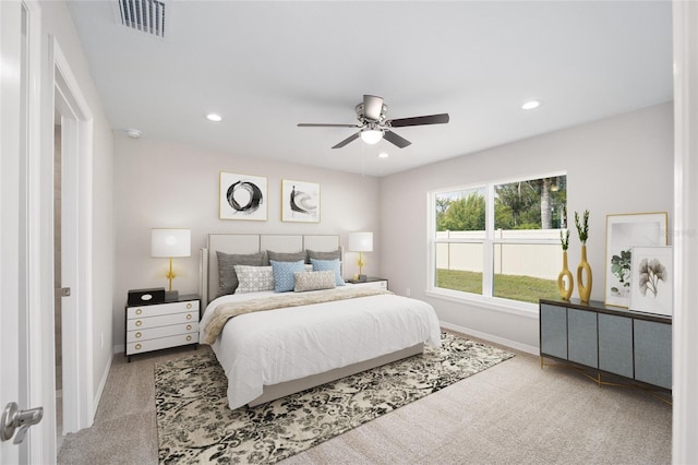 carpeted bedroom featuring ceiling fan