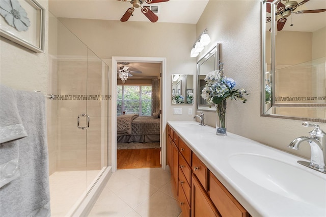 bathroom with wood-type flooring, vanity, walk in shower, and ceiling fan