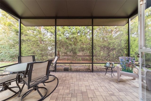 unfurnished sunroom featuring a healthy amount of sunlight