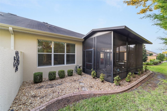 exterior space with a sunroom