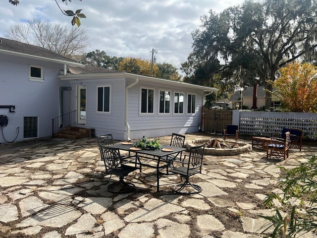 view of patio featuring an outdoor fire pit