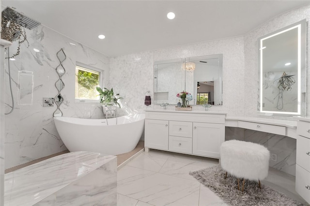 bathroom featuring vanity and a bathing tub