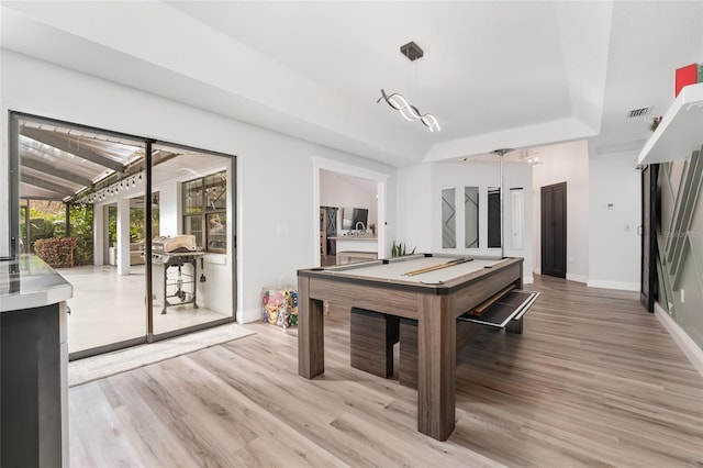 playroom with billiards and light hardwood / wood-style flooring