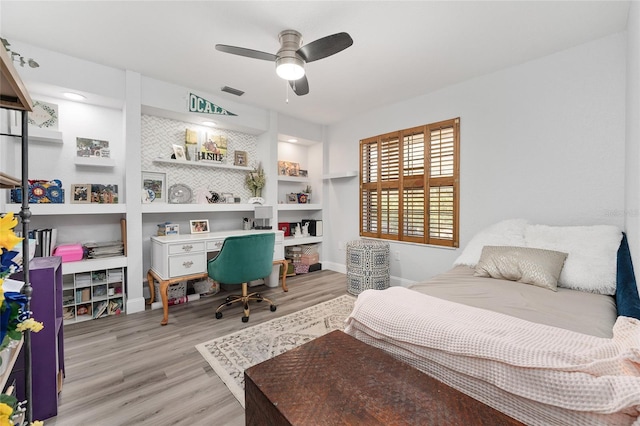 bedroom featuring ceiling fan and light wood-type flooring