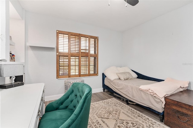 bedroom featuring ceiling fan and hardwood / wood-style flooring