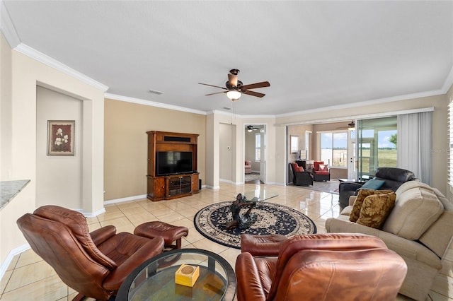 tiled living room featuring french doors, ceiling fan, and ornamental molding