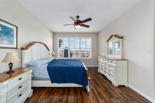 bedroom with ceiling fan and dark hardwood / wood-style flooring