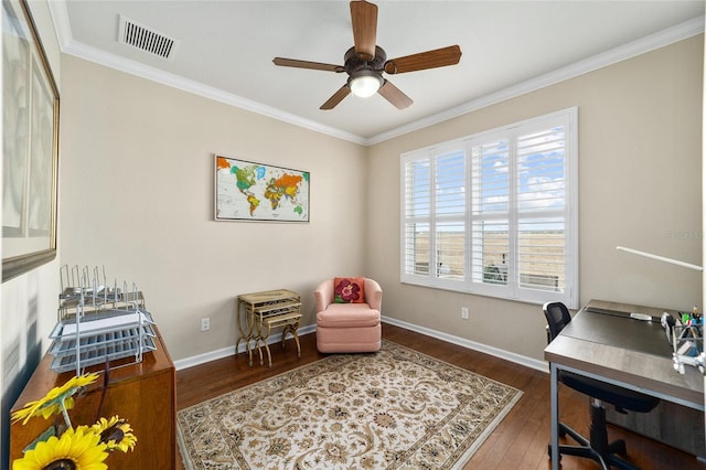 home office featuring ornamental molding, ceiling fan, and dark wood-type flooring