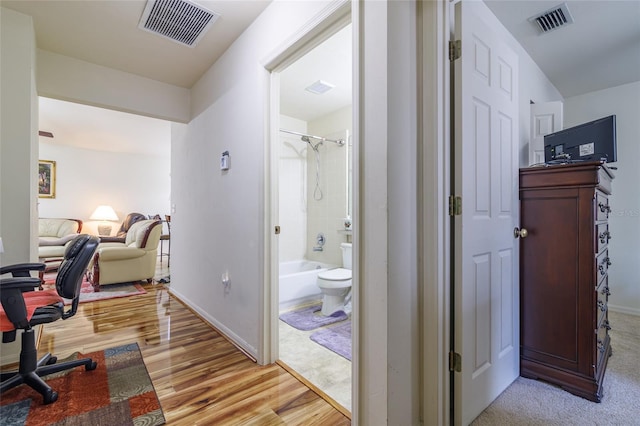 home office featuring light hardwood / wood-style floors