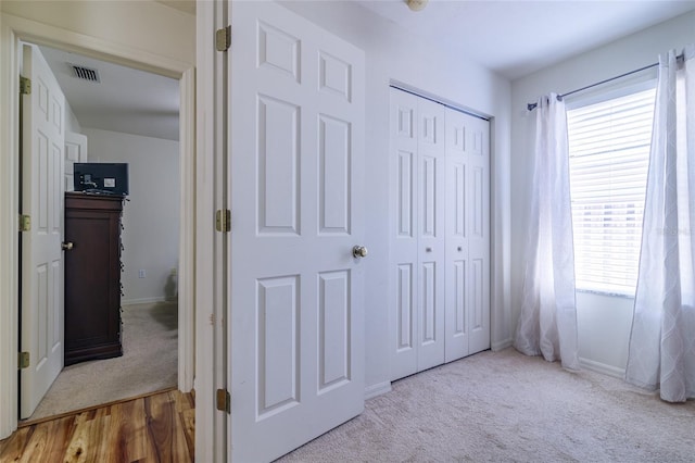 bedroom with light hardwood / wood-style floors