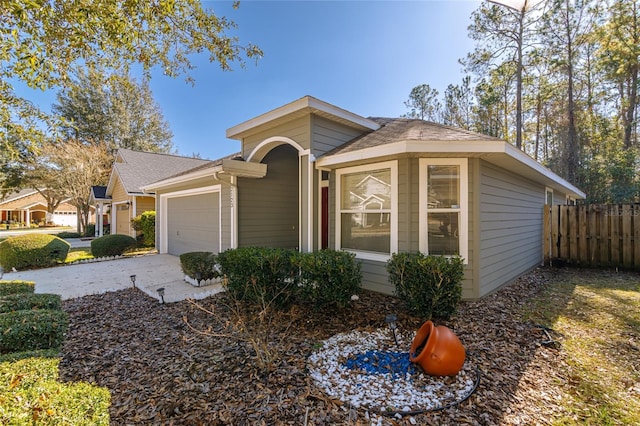 single story home with a garage