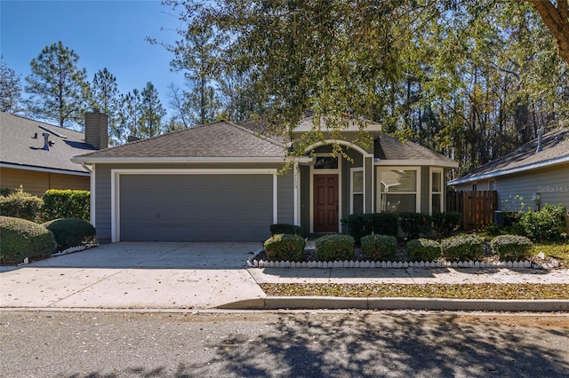 view of front of property featuring a garage