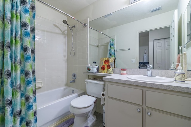 full bathroom featuring vanity, toilet, and shower / tub combo with curtain