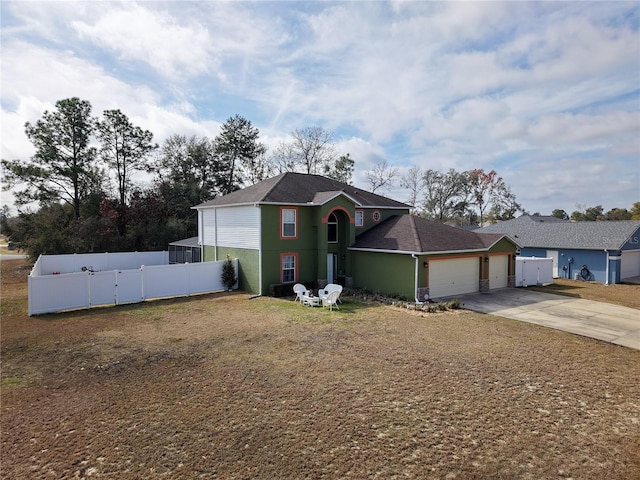 view of front of property featuring a garage