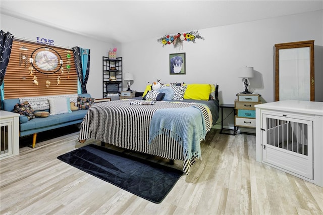 bedroom featuring light wood-type flooring