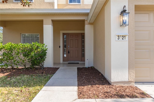 property entrance featuring covered porch