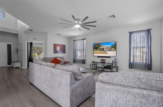 living room with hardwood / wood-style floors and ceiling fan