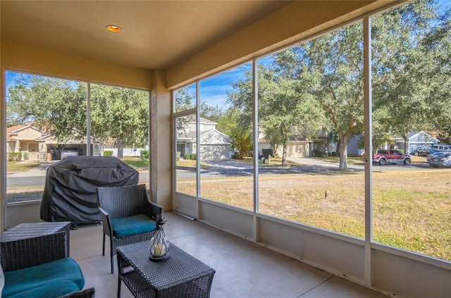 unfurnished sunroom with a wealth of natural light