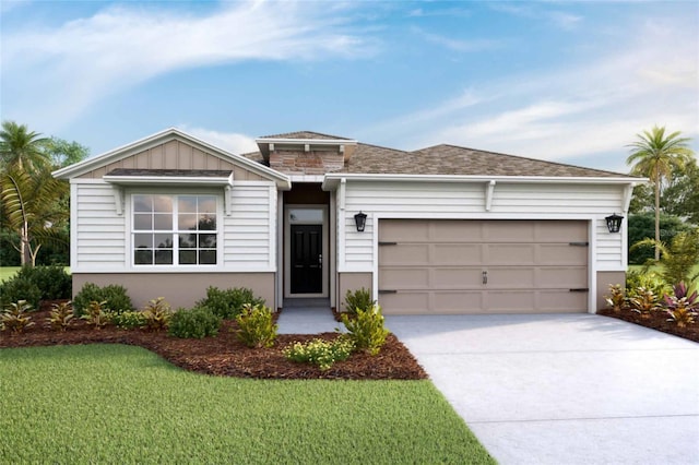 ranch-style house featuring a front yard and a garage