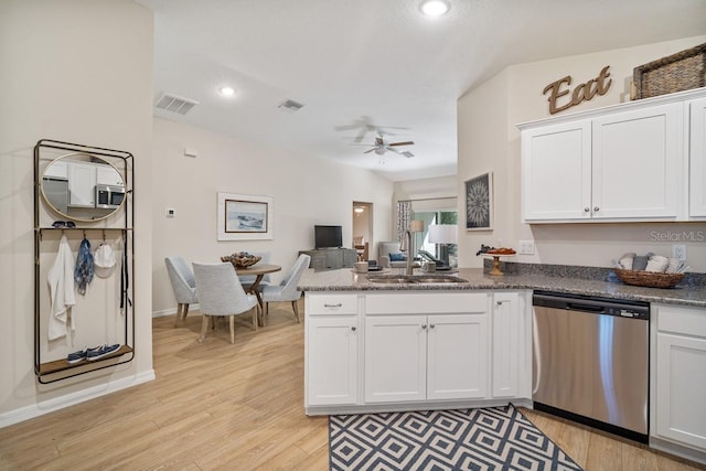 kitchen featuring dishwasher, white cabinetry, sink, kitchen peninsula, and ceiling fan