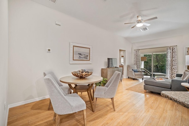 dining area featuring ceiling fan and hardwood / wood-style flooring