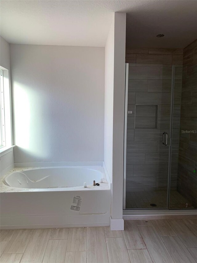 336 W Rexford Dr, Beverly Hills, FL 34465 - bathroom with a stall shower and a bath