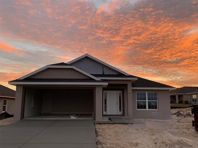 view of front of home with a garage