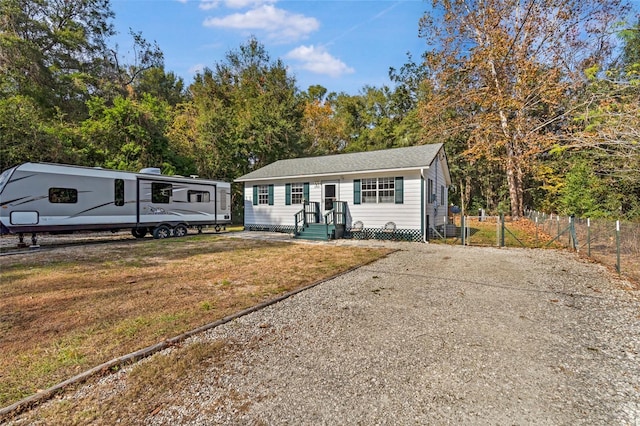 view of front of house with a front lawn