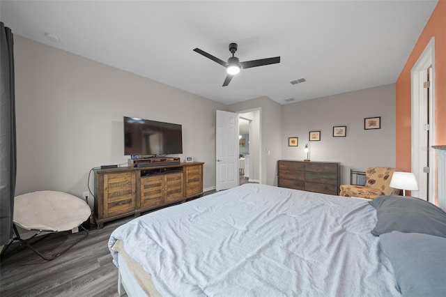 bedroom featuring ceiling fan and dark hardwood / wood-style floors