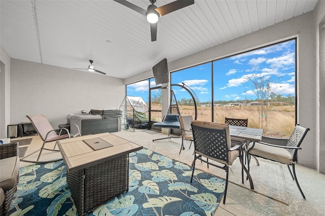 10564 SW 98th Ln, Ocala, FL 34481 - sunroom featuring a ceiling fan, outdoor dining area, and a jacuzzi