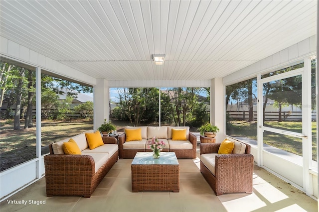 sunroom / solarium with plenty of natural light