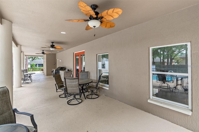 view of patio with ceiling fan