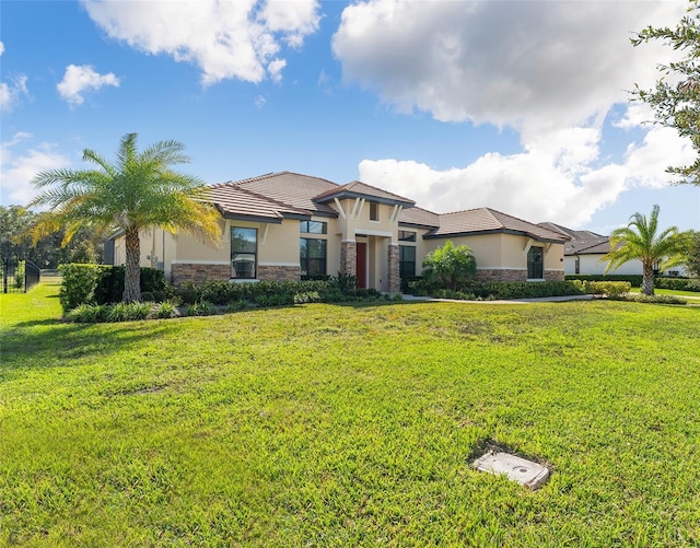 view of front of house with a front lawn