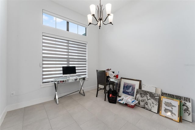 office area featuring a chandelier